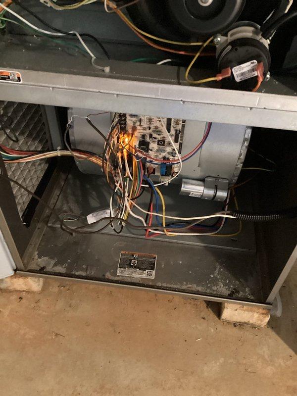 Completed MVP heating maintenance visit on gas furnace system. Performed combustion analysis using Bacharach analyzer, confirming proper natural gas combustion with readings showing 9.1% oxygen, 23 ppm carbon monoxide, and 88.4% combustion efficiency. Inspected internal components including blower motor, control board wiring, capacitor, and refrigerant lines. Verified all electrical connections and wire terminations at control board are secure. System operating within normal parameters.