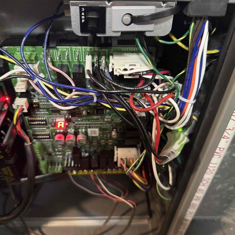 Completed installation of three surge protectors on furnace system to provide electrical protection for control board and critical components. Replaced air filter and verified all electrical connections at contactor and control board were secure. System tested and operating within normal parameters upon completion.