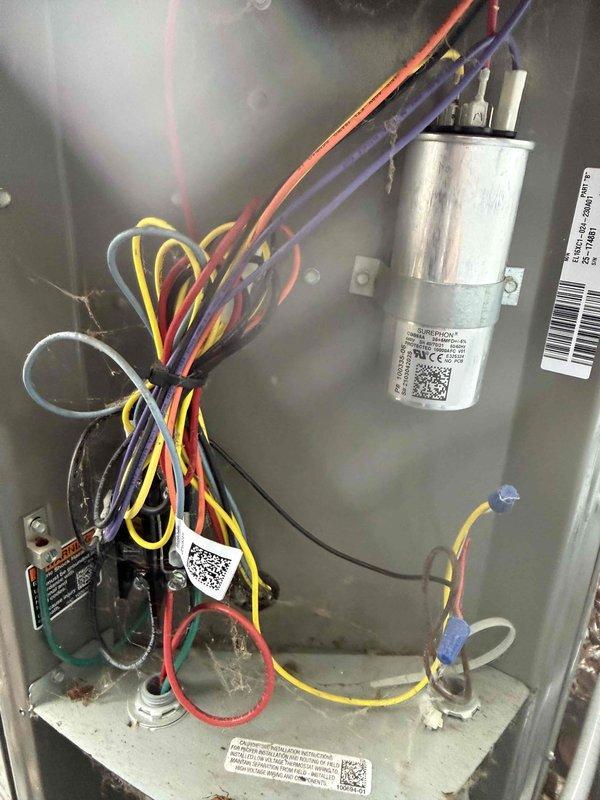 Completed early bird A/C tune-up on 3.5-year-old system installed August 2022. Performed comprehensive inspection of outdoor condensing unit and indoor air handler, verified proper operation of dual-run capacitor and contactor assembly, checked all electrical connections and wire terminations secured with zip ties, inspected refrigerant line set insulation condition, examined condensate drain system including P-trap configuration, and documented equipment condition with photos. All components found operating within normal parameters with no immediate service needs identified.