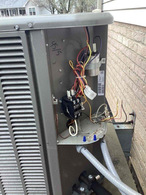 Completed comprehensive AC tune-up on residential split system, including inspection of indoor furnace/air handler unit and outdoor condensing unit. Performed standard maintenance procedures including electrical component testing, refrigerant line inspection, and system safety checks. Customer reported issue with humidifier cover panel repeatedly detaching; noted for follow-up assessment and repair.