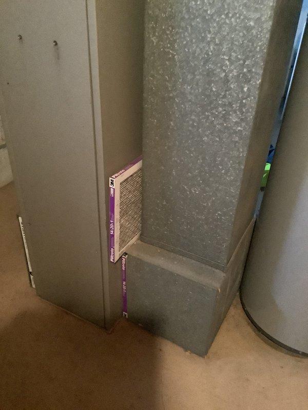 Conducted comprehensive on-site assessment of existing heating system and evaluated property for new air conditioning installation. Documented current furnace configuration in basement mechanical room, including existing Aprilaire humidification equipment, ductwork layout, and available utility connections. Evaluated interior duct chase routing from basement through living space to determine optimal equipment placement and sizing requirements for complete HVAC system replacement with added cooling capacity.