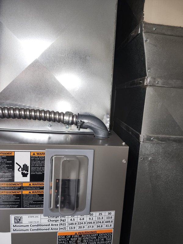 Completed installation of wireless thermostat and humidistat for new HVAC system. Installed electrical disconnect box with proper safety labeling on ductwork in attic space, ran liquidtight flexible conduit for power connections, and mounted control panel with circuit breakers in mechanical area. All components properly secured, wired, and tested for proper operation per manufacturer specifications and local building codes.