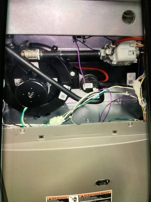 Completed routine maintenance tune-up on two furnace units and two air conditioning systems, all approximately 8 years old. Performed comprehensive inspection of all HVAC components including blower motor assemblies, electrical connections, capacitors, refrigerant lines, and insulation panels. Verified proper operation of all mechanical and electrical systems, confirmed secure wire connections throughout both units, and ensured all safety warning labels remained visible and intact.