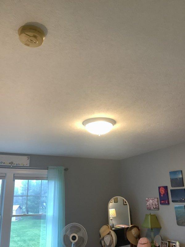 Replaced two flush-mount ceiling light fixtures in a 20-year-old residential property, installing new units in a bedroom and walk-in closet. Both fixtures were direct replacements utilizing existing electrical boxes and wiring, requiring no additional electrical modifications. Verified proper operation of both fixtures upon completion and confirmed adequate illumination in both spaces.