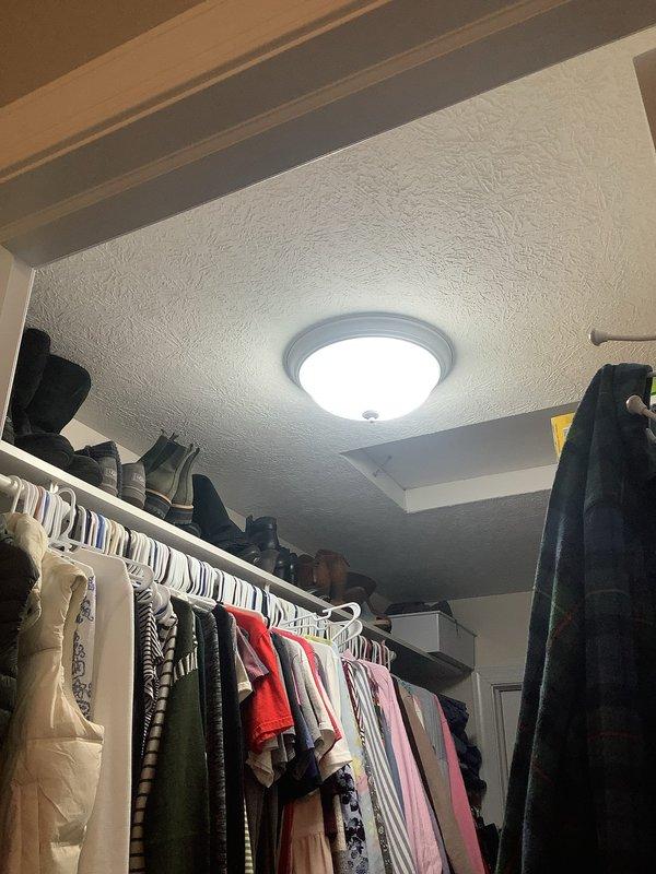 Replaced two flush-mount ceiling light fixtures in a 20-year-old residential property, installing new units in a bedroom and walk-in closet. Both fixtures were direct replacements utilizing existing electrical boxes and wiring, requiring no additional electrical modifications. Verified proper operation of both fixtures upon completion and confirmed adequate illumination in both spaces.