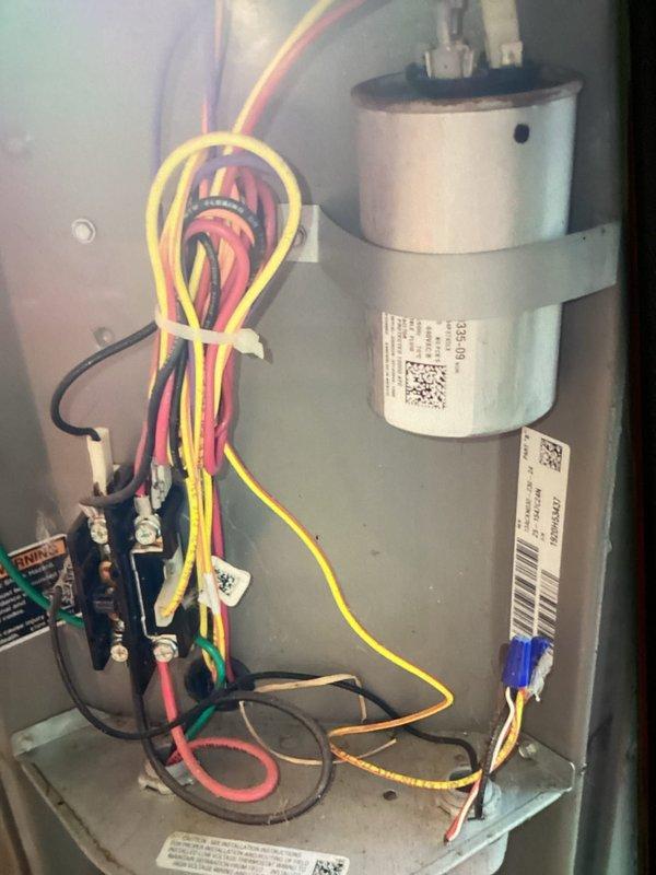 Completed MVP cooling maintenance on Lennox HVAC system. Performed comprehensive inspection of electrical components including capacitor, contactor, and wiring harness connections. All electrical connections verified secure with proper wire management via zip ties. Inspected ductwork and noted significant condensation on metal supply plenum, indicating proper system cooling operation. Checked BlendAir Saver humidifier integration and associated PVC connections. System operating within normal parameters upon completion of maintenance protocol.