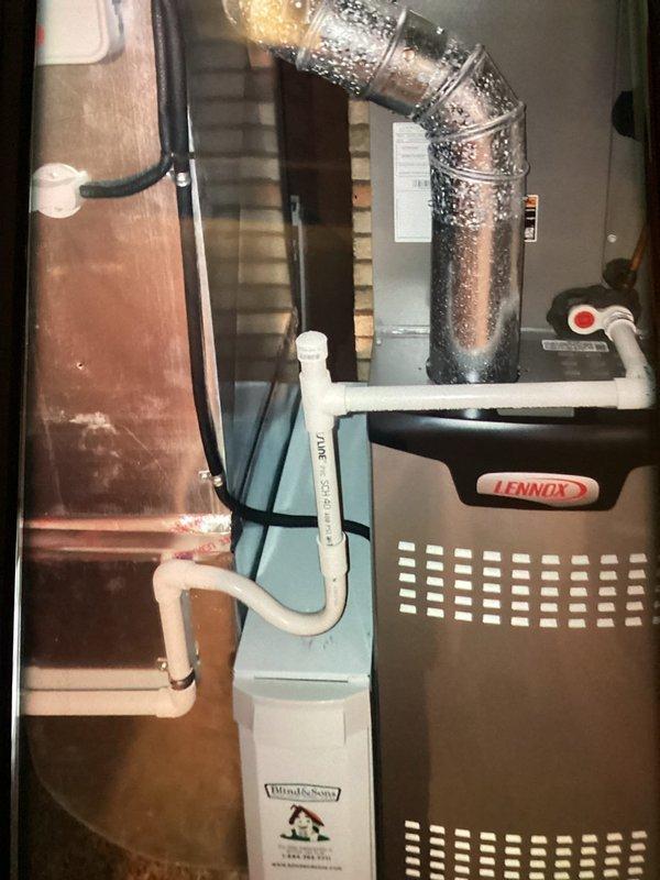 Completed MVP cooling maintenance on Lennox HVAC system. Performed comprehensive inspection of electrical components including capacitor, contactor, and wiring harness connections. All electrical connections verified secure with proper wire management via zip ties. Inspected ductwork and noted significant condensation on metal supply plenum, indicating proper system cooling operation. Checked BlendAir Saver humidifier integration and associated PVC connections. System operating within normal parameters upon completion of maintenance protocol.