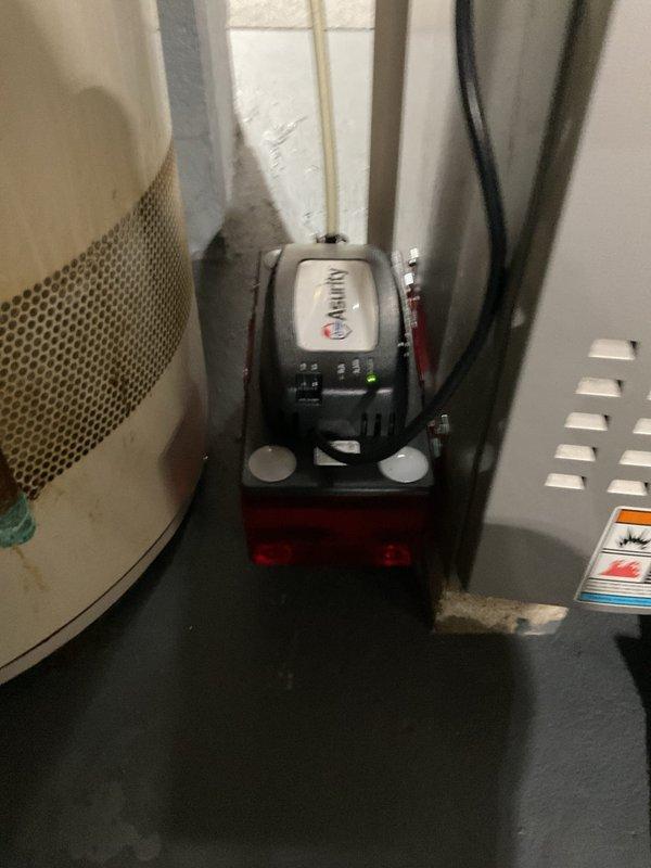 Responded to callback for water leak on recently installed AC system. Upon arrival, inspected condensate drainage system and found condensate pump operational but reservoir experiencing overflow issues. Verified pump discharge line routing and confirmed proper operation of safety float switch. Checked air handler drain pan for blockages and ensured primary and secondary drain lines were clear and flowing properly. System tested and monitored through complete cooling cycle with no further leakage observed.