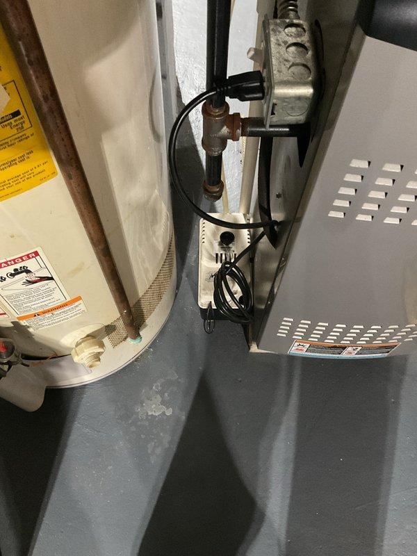 Responded to callback for water leak on recently installed AC system. Upon arrival, inspected condensate drainage system and found condensate pump operational but reservoir experiencing overflow issues. Verified pump discharge line routing and confirmed proper operation of safety float switch. Checked air handler drain pan for blockages and ensured primary and secondary drain lines were clear and flowing properly. System tested and monitored through complete cooling cycle with no further leakage observed.