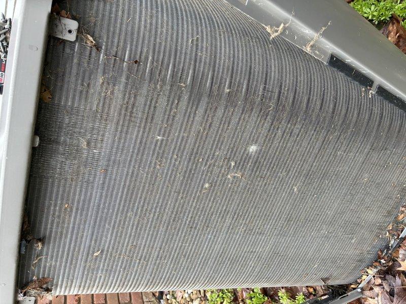 Completed MVP recurring cooling maintenance visit. Performed visual inspection of outdoor condensing unit, noting significant dirt and debris accumulation on condenser coil fins with organic matter and dust reducing airflow efficiency. Inspected control board assembly and electrical connections, confirming all wiring harnesses, relays, capacitors, and circuit components functioning properly with no signs of damage or wear.