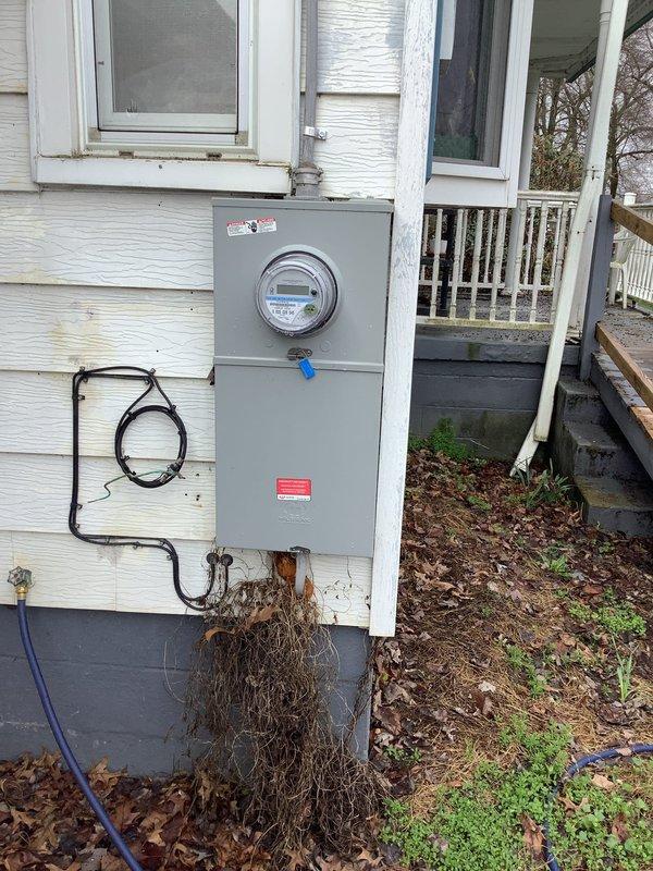 Installed complete outdoor lamp post assembly including setting post, pouring concrete foundation, backfilling with soil, and completing electrical wiring connections to existing light fixture. Coordinated delivery and installation of all required materials including post hardware and electrical components to establish fully functional exterior lighting system.