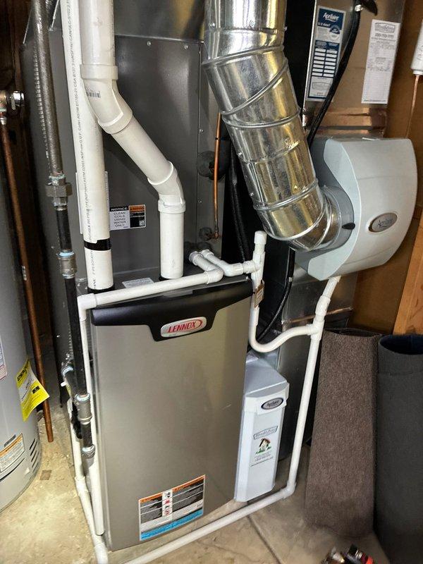 Completed spring maintenance on three-year-old Lennox cooling system. Inspected blower wheel assembly, noted minor dust accumulation on blades but within acceptable operating parameters. Verified all mechanical components, ductwork connections, condensate drainage system, and safety controls functioning properly with no deficiencies requiring immediate attention.