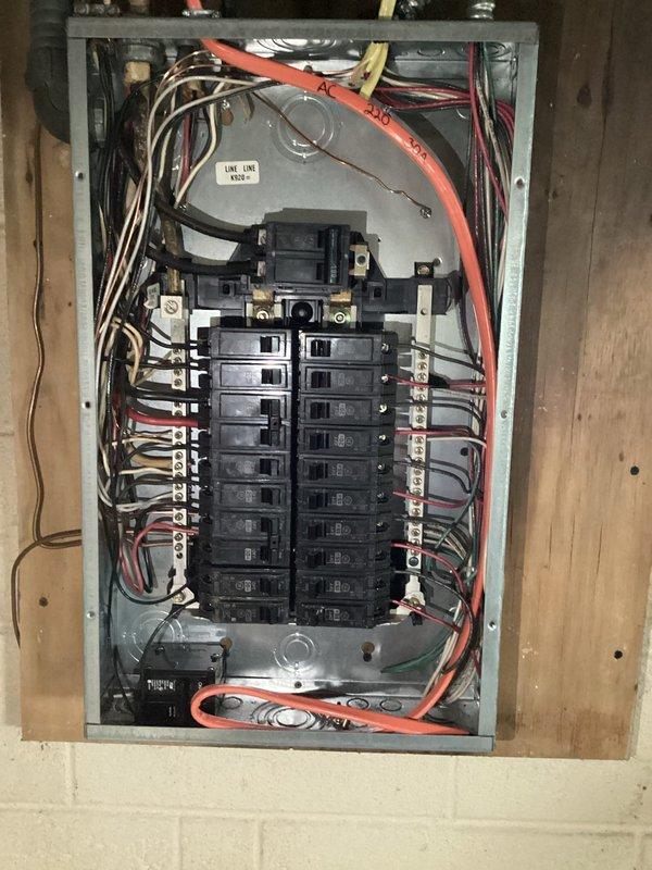Responded to service call for two non-functioning outlets and conversion of a two-prong outlet to a three-prong grounded receptacle. Inspected electrical panel and identified circuit breaker issues affecting the malfunctioning outlets. Traced wiring from panel through junction boxes to locate fault points, tested circuits for proper voltage and grounding, and repaired/replaced defective outlets. Upgraded two-prong outlet to three-prong GFCI-protected receptacle with proper grounding per current electrical code requirements. Verified all circuits functioning properly and confirmed ground fault protection operational before restoring power.