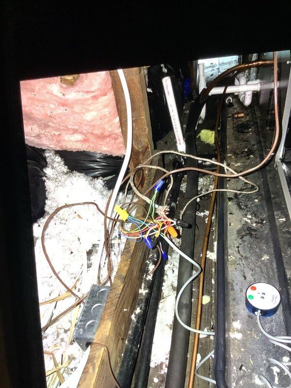 Responded to service call for newly installed air conditioning system running continuously without cycling off. Inspected system components in attic space including electrical connections, control wiring, and thermostat circuit. Identified faulty thermostat wiring connection preventing proper communication between thermostat and air handler. Corrected wire terminations at air handler junction, verified proper voltage at control board, and tested system operation through multiple cooling cycles. Unit now cycling properly with thermostat commands.