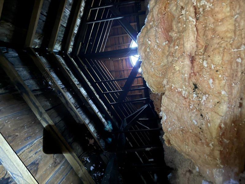 Conducted comprehensive estimate for furnace and air conditioning installation with complete ductwork system for a 4-bedroom, 2-bathroom residence currently heated by steam boiler. Assessed crawl space and attic areas to determine optimal HVAC equipment placement and duct routing. Documented existing conditions including foundation moisture concerns with visible efflorescence on basement walls, aged wooden floor joists, and current attic insulation and ductwork configuration. Provided detailed proposal for new forced air heating and cooling system to replace existing steam boiler, including equipment specifications, ductwork design, and installation requirements for customer's decision-making process.