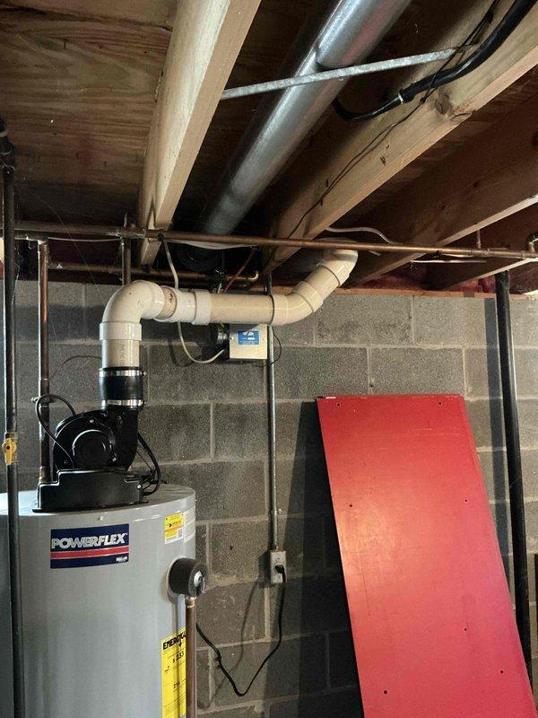 Conducted comprehensive on-site assessment for complete furnace and air conditioning system replacement. Evaluated existing HVAC equipment, ductwork configuration, and utility connections in basement mechanical room. Documented current system layout including water heater proximity, PVC venting arrangements, metal ductwork routing through ceiling joists, and available clearances for new equipment installation. Provided detailed estimate for replacement system based on observed conditions and spatial requirements.