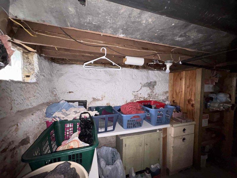 Conducted comprehensive electrical estimate for standby generator installation at residential property. Assessed existing basement electrical infrastructure, including exposed wiring runs along ceiling joists and current panel capacity. Documented site conditions through photographic survey of proposed installation area in unfinished basement space with stone/concrete block walls and exposed structural elements. Evaluated access pathways for equipment placement, fuel line routing options, and transfer switch location. Identified necessary electrical upgrades to accommodate generator system integration with existing service. Provided detailed scope of work and material requirements for automatic transfer switch installation and generator connection to main electrical panel.