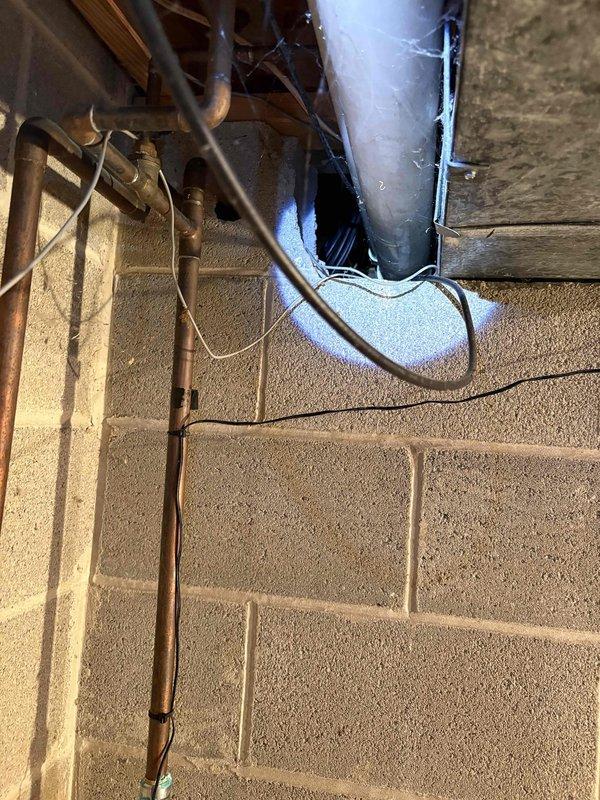 Conducted furnace replacement estimate at residential property. Unit is located in confined basement mechanical room with limited access, requiring removal for proper service or replacement. Provided quote for new equipment installation with appropriate labor considerations due to challenging installation conditions.