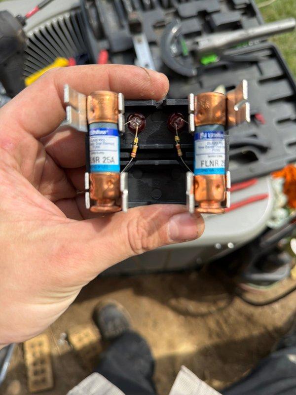 Completed full HVAC system installation including AC unit and tankless water heater. Installed new electrical disconnect with FLNR 25A fuses and proper wiring connections for equipment protection. Ran and insulated copper refrigerant lines and water supply lines using foam pipe insulation to prevent heat loss and condensation. Installed isolation valves with service ports on water lines for future maintenance access. Secured all piping, verified electrical connections, and ensured proper clearances for safe operation and code compliance.