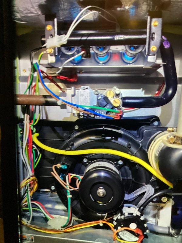 Responded to service call for post-flood furnace inspection on 3-year-old natural gas unit. Performed comprehensive system operational verification including visual inspection of all internal components, gas valve manifold assembly, electrical control board connections, and blower motor assembly. Confirmed proper system operation with flue temperature reading of 206°F, indicating normal combustion and heat exchanger performance. All components functioning correctly with no water damage detected to critical systems.