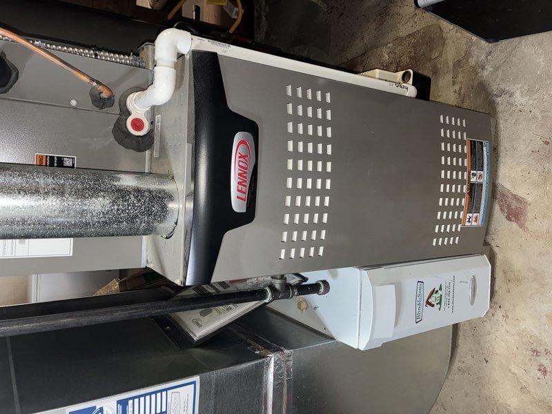 Completed comprehensive maintenance tune-up on 5-year-old Lennox furnace and air conditioning system. Performed standard inspection procedures including checking heat exchanger coils, verifying proper ductwork connections, inspecting condensate drain lines, and testing system operation. Customer confirmed air filter was recently replaced, so no filter change was required at this time. Both heating and cooling units are functioning properly with no issues identified during inspection.