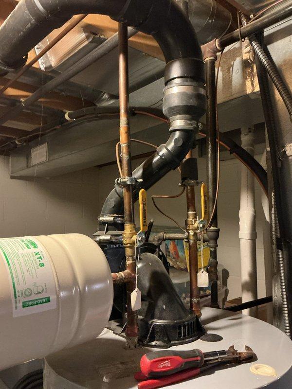 Responded to report of leaking pressure relief valve on tanked water heater. Upon arrival, confirmed active leak from T&P relief valve assembly mounted on side of unit. Replaced defective pressure relief valve with new component from truck stock, tested operation to ensure proper function and verified no additional leaks present at connection points.