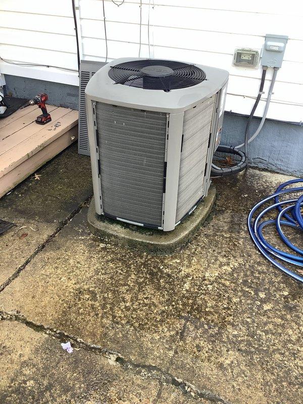 Completed preventive maintenance visit on residential Lennox air conditioning system. Performed standard cooling season inspection of outdoor condenser unit, including visual assessment of cabinet condition, electrical connections, and refrigerant lines. Unit found to be operational with no immediate service needs identified. Noted moderate weathering and biological growth on concrete pad surrounding equipment, though this does not affect system performance. All electrical components including disconnect box and conduit connections inspected and found secure.