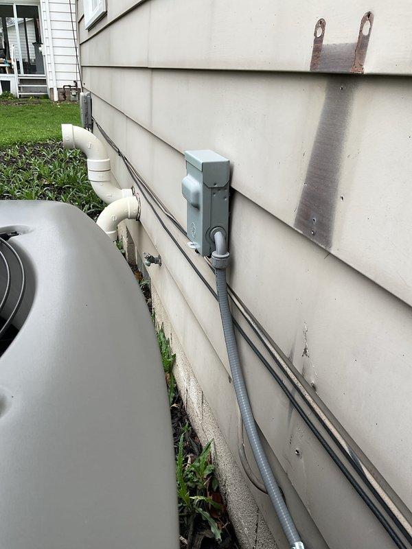 Completed MVP cooling maintenance visit on residential HVAC system. Performed standard preventive maintenance inspection of outdoor condensing unit, verified electrical connections at disconnect box, and checked refrigerant lines and condensate drainage system. Inspected Aprilaire whole-home humidifier integrated with ductwork system to ensure proper operation and readiness for upcoming season.