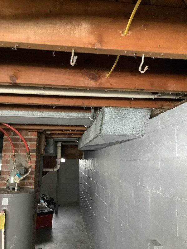 Installed dedicated electrical outlet at back door location for VPL equipment. Ran new circuit from main electrical panel through basement utility area, routing conduit along existing infrastructure to maintain clean installation. Verified proper grounding, tested outlet functionality, and ensured all work met current electrical code requirements.