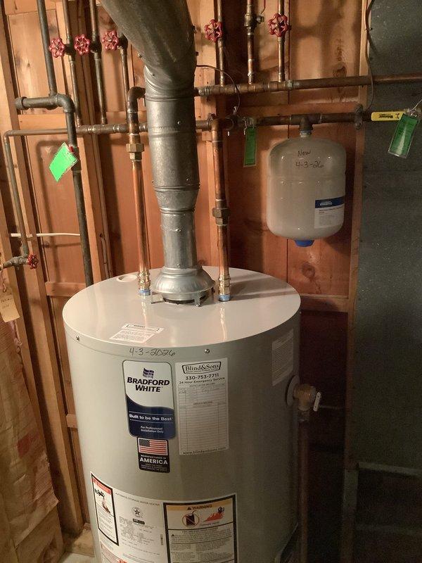 Completed routine maintenance flush on Bradford White tanked water heater as scheduled. Drained sediment buildup from tank bottom, inspected gas control valve assembly and confirmed proper operation of Honeywell Iconix control system with digital status display. Verified all copper supply lines, shut-off valves, expansion tank, and venting connections were secure and functioning correctly with no leaks detected.