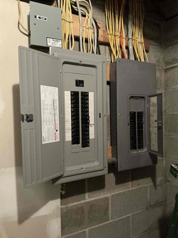 Completed estimate for mini split installation in room above garage. Inspected attic space above garage and identified existing ductwork that may allow for extension to serve the room, which currently has baseboard heat. Assessed electrical panel capacity and documented site conditions for proposal preparation.