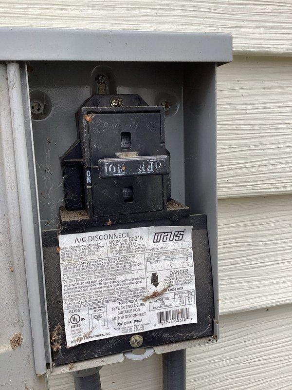 Completed routine MVP cooling maintenance visit on 13-year-old system. Inspected exterior A/C disconnect switch and verified proper operation; unit showed normal weathering consistent with age. Examined evaporative cooler pad filter assembly and noted mineral deposit accumulation and discoloration on mesh media, indicating normal usage patterns. All accessible components functioning within acceptable parameters for system age.