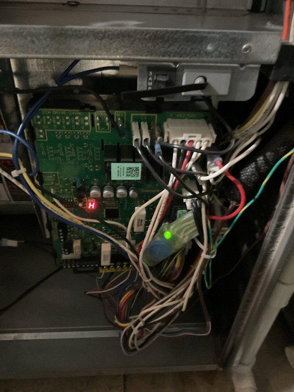 Replaced defective circuit board and flame sensor on heating system. Upon installation of new components, verified proper system operation with all indicator lights functioning correctly and unit cycling normally. Confirmed all electrical connections secure and refrigerant lines properly positioned.