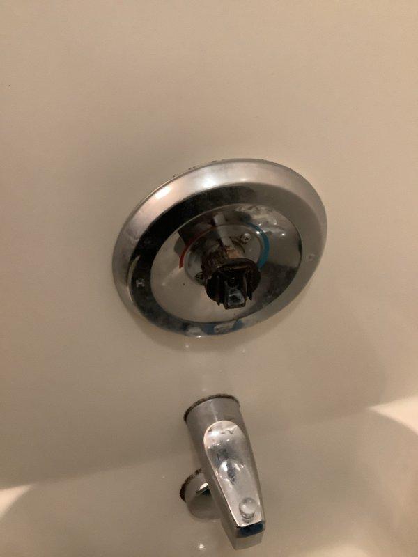 Responded to service call for noisy shower valve operation. Conducted on-site assessment of bathroom shower and tub fixture system. Inspected single-handle shower control valve with chrome trim and circular escutcheon plate mounted on tiled wall. Examined internal valve components, noting mechanical assembly and operational characteristics contributing to noise issue. Evaluated tub spout with diverter mechanism and overall plumbing configuration. Documented existing fixture conditions through photographs showing shower control assembly, wall-mounted hardware, and bathtub spout installation. Provided comprehensive quote for complete shower valve replacement to resolve noise concern and ensure proper fixture operation.