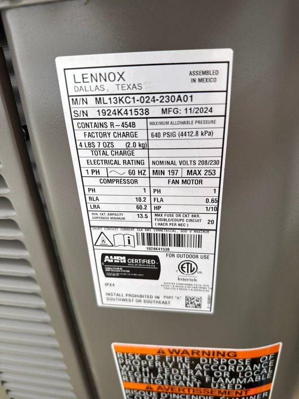 # HVAC Install - Complete System

Completed installation of a 90% efficiency furnace and air conditioning system at residential property. Installed new Lennox ML13KC1-024-230A01 outdoor condensing unit with R-454B refrigerant, rated at 208/230V, single phase, 60Hz. Unit was properly positioned on black composite pad with adequate clearance from structure. Established all required electrical connections via weatherproof conduit and junction box mounted to exterior wall. Installed PVC condensate drainage lines with proper pitch and termination points. Verified all manufacturer specifications for electrical ratings, including compressor RLA/LRA values and fan motor requirements. System tested and confirmed operational, with all safety labels and certifications visible and intact. Installation meets current code requirements for outdoor HVAC equipment placement and clearances.