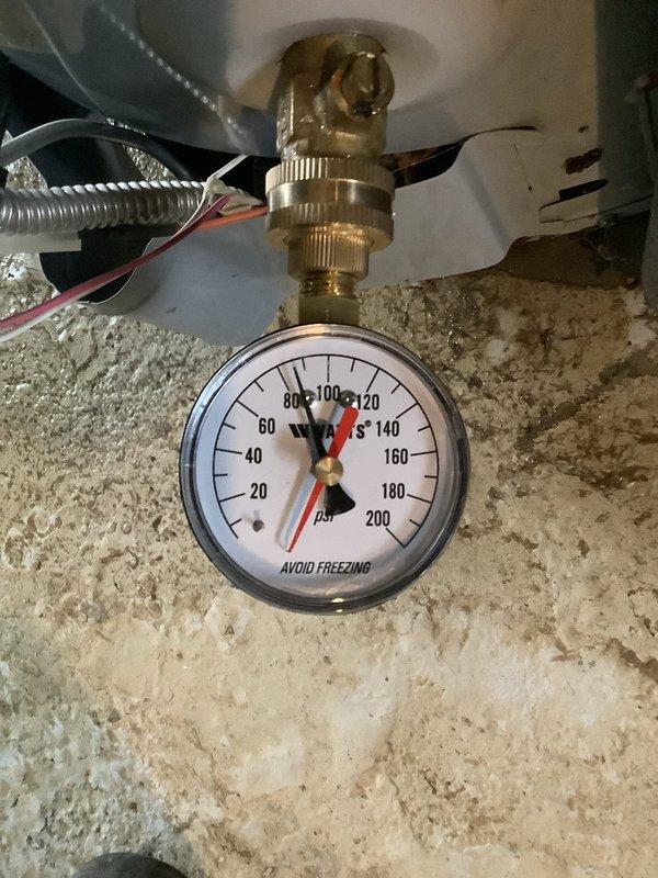 Assessed water heater damaged by flooding and provided estimate for gas valve repair. Documented existing pressure gauge, plumbing connections, and overall system condition with photographs to support repair quote and potential replacement options.