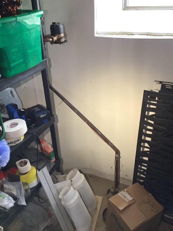 Assessed water heater damaged by flooding and provided estimate for gas valve repair. Documented existing pressure gauge, plumbing connections, and overall system condition with photographs to support repair quote and potential replacement options.