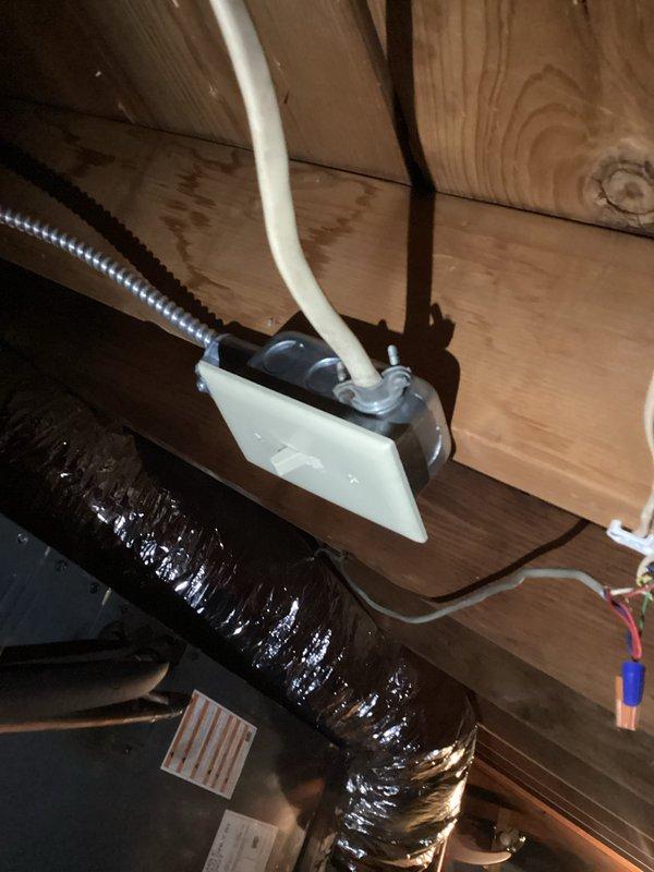 Installed dedicated electrical circuit wiring for air handler unit in attic space. Ran new conductors from main electrical panel through utility area to attic location, terminating at air handler condensate pan area. Connected circuit protection at panel and secured all wiring per code requirements.