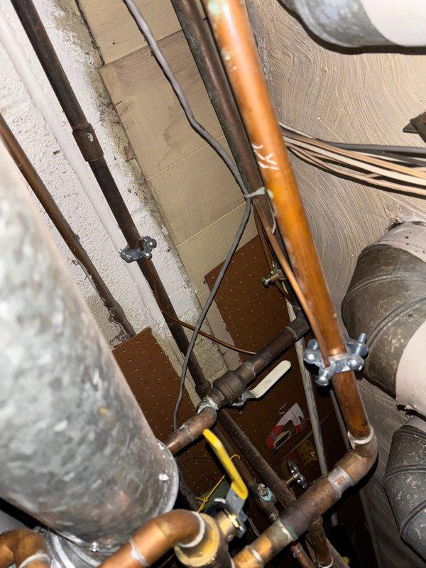 Installed 22KW standby generator with automatic transfer switch and cold weather kit for residential application. Extended above-ground gas line by 15 feet to reach generator location and made all necessary connections to existing utility infrastructure. No electrical disconnect was required per utility company specifications, allowing for direct integration with the illuminating company's service.