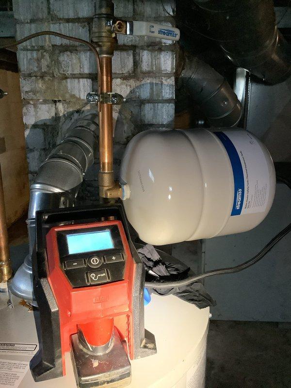 Responded to emergency call for water heater failure and basement flooding from unit originally installed five years prior. Upon arrival, conducted thorough inspection of tanked water heater system and associated plumbing infrastructure. Identified source of leak and assessed extent of water damage to surrounding area. Examined copper supply lines, pressure relief valve, drain valve, and tank integrity to determine failure point. Documented existing conditions including piping connections, pressure tank, and mechanical room components. Evaluated system pressure and tested all valves and fittings for proper operation. Provided customer with assessment findings and recommended corrective action plan to resolve leaking issue and restore hot water service.