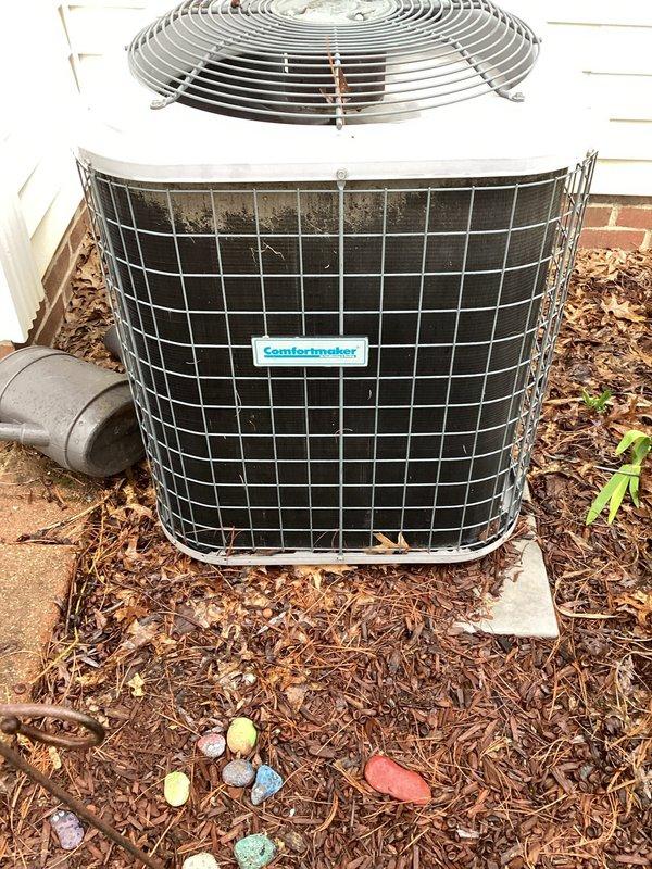 Completed scheduled preventive maintenance on Comfortmaker air conditioning system. Inspected outdoor condenser unit, verified proper operation of fan motor and compressor, checked refrigerant levels, and cleaned debris from coil surfaces. Evaluated indoor components including return air grille and Honeywell Home thermostat for proper functionality, confirmed adequate airflow throughout system, and verified all controls operating within normal parameters.