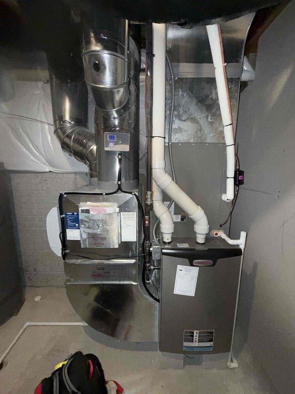 Completed scheduled MVP cooling maintenance visit on 5-year-old HVAC system. Performed comprehensive inspection of furnace and air handler assembly, including examination of control board wiring, electrical connections, and safety circuits. Verified proper operation of dual PCB control boards and associated wiring harnesses. Inspected condensate drain lines, refrigerant piping, and ductwork connections for proper installation and function. All components found operating within normal parameters with no issues identified. System confirmed ready for continued service.