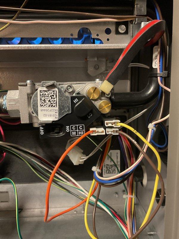 Responded to no heat call on five-year-old furnace with no airflow. Upon inspection, found unit completely non-operational with gas valve assembly and control board accessible for diagnostics. Verified proper venting configuration with PVC intake and exhaust pipes, checked all electrical connections at gas valve terminals, and inspected pressure switch and safety circuits. All wiring harnesses, including thermostat wiring and limit switch connections, were examined for continuity and proper seating. Unit components appeared clean and well-maintained with no visible signs of wear or damage to internal mechanisms.