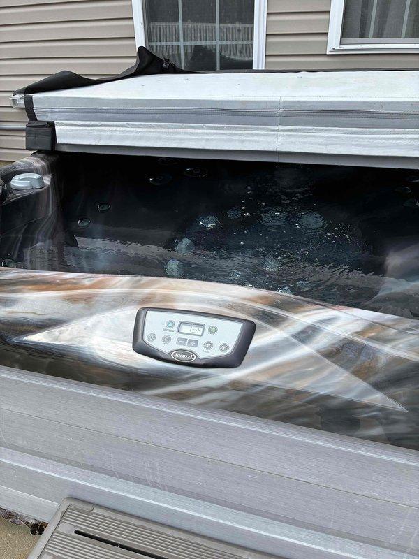 Responded to service call for newly installed hot tub experiencing incorrect voltage issue. Upon inspection, confirmed unit was receiving 120V instead of required 240V due to improper wiring configuration at the electrical panel. Identified that red and white conductors were incorrectly connected, causing the voltage discrepancy. Corrected the wiring connections at the breaker panel, ensuring proper phase-to-phase configuration for 240V operation. Verified hot tub control panel and GFCI protection were functioning correctly after repairs. System tested and confirmed operational at proper voltage specifications.