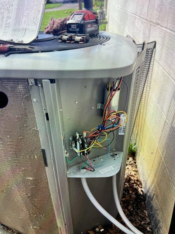 Completed comprehensive preventive maintenance on a six-year-old residential air conditioning system. Performed system diagnostics with electrical testing equipment, inspected internal wiring and connections within the condenser unit, verified proper electrical components operation, and checked refrigerant line connections. All components found operating within normal parameters and system returned to service.