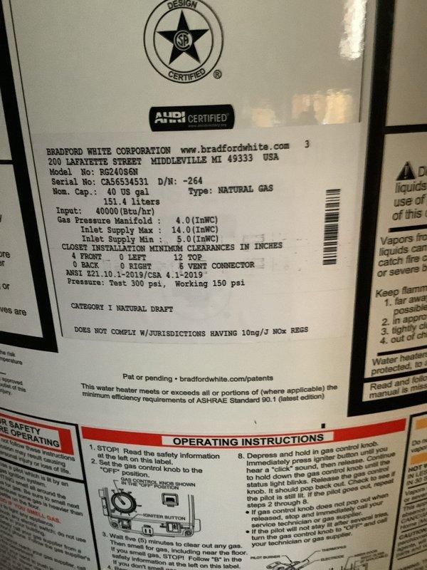 Replaced existing 40-gallon water heater with new Bradford White 40-gallon natural gas tank model BR240S6N. Installation included new water shut-off valve and thermal expansion tank to meet current code requirements. Unit features Category I natural draft venting with 40,000 BTU/hr input rating and 150 psi working pressure. All copper supply lines connected, flue pipe properly vented, and system tested for proper operation. Six-year manufacturer tank warranty applies.