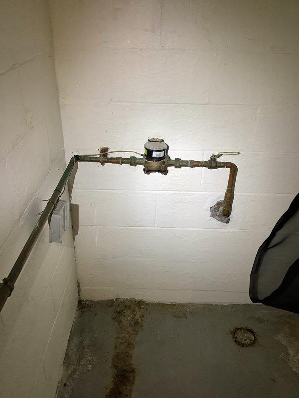 Responded to pre-sale home inspection findings regarding damaged service mast and conductors with missing or compromised insulation. Inspected exterior service entrance equipment, documented existing conditions showing deteriorated wire insulation that had been temporarily sealed with electrical tape, and assessed safety concerns. Completed necessary repairs to bring service entrance conductors up to code compliance standards, ensuring proper insulation integrity and weatherproofing of all exposed wiring at the service mast connection point.