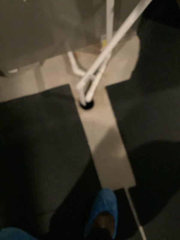 Responded to service call for foreign object lodged in basement drain line. Customer reported golf ball had fallen into drain opening. Accessed main drain cleanout in basement area to locate and remove obstruction. Successfully extracted golf ball from drain line using appropriate retrieval tools. Inspected P-trap assembly and downstream plumbing connections under sink to verify proper drainage flow and ensure no secondary blockages or damage occurred. Confirmed all drain lines flowing freely with no restrictions. Tested system operation and verified complete restoration of normal drainage function.