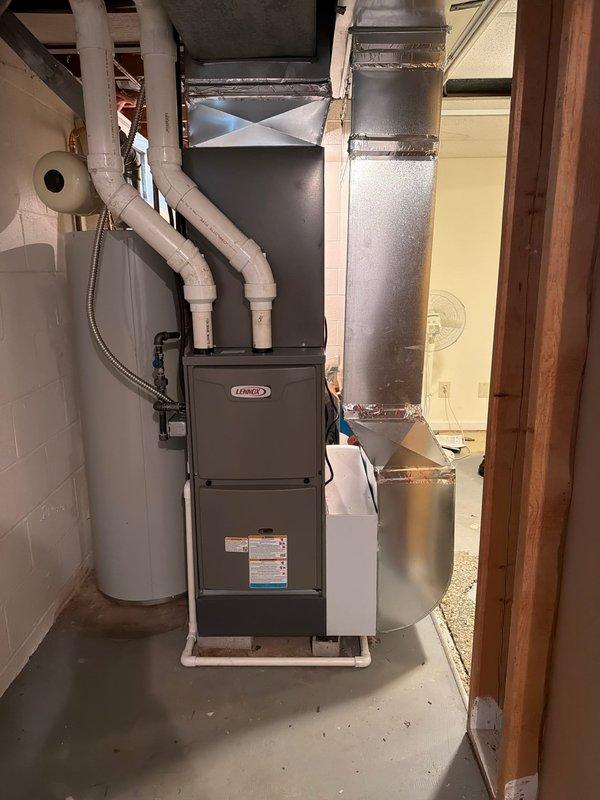 Completed full HVAC system installation in basement mechanical room, including new Lennox furnace unit, air conditioning system, and associated ductwork. Installed and tested all electrical connections, configured digital controls, and verified proper operation of all components. Routed PVC condensate drainage lines and connected metallic supply/return ductwork with proper insulation to ensure efficient system performance.