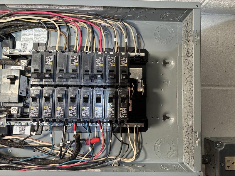Responded to service call for sparking electrical box. Upon arrival, inspected exterior electrical service equipment and main breaker panel. Identified faulty breaker connection causing arcing and sparking hazard. De-energized panel, removed damaged breaker, cleaned bus bar connections, and installed new circuit breaker. Verified all wire connections were secure and properly torqued to manufacturer specifications. Restored power, tested all circuits for proper operation, and confirmed no additional arcing or sparking present. Panel now operating safely within code compliance.